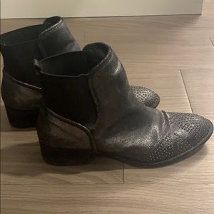 Silver boots with stud detailing